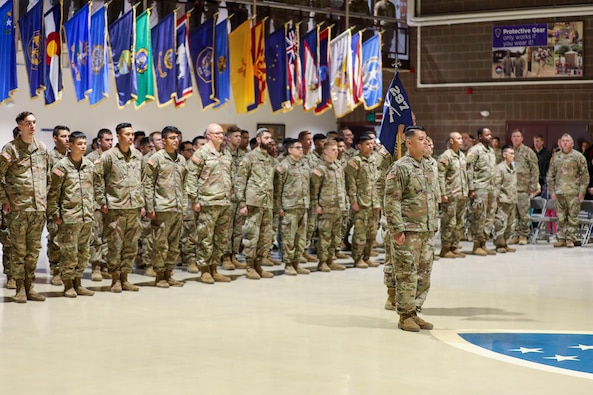 Alaska Army National Guardsmen with Bravo Company, 1st Battalion, 297th Infantry Regiment, and their families were honored during a deployment ceremony at the Alaska National Guard Armory on Joint Base Elmendorf-Richardson, Sept. 29, 2023. Approximately 100 Soldiers are deploying to the Middle East for nine months in support of Operation Spartan Shield.