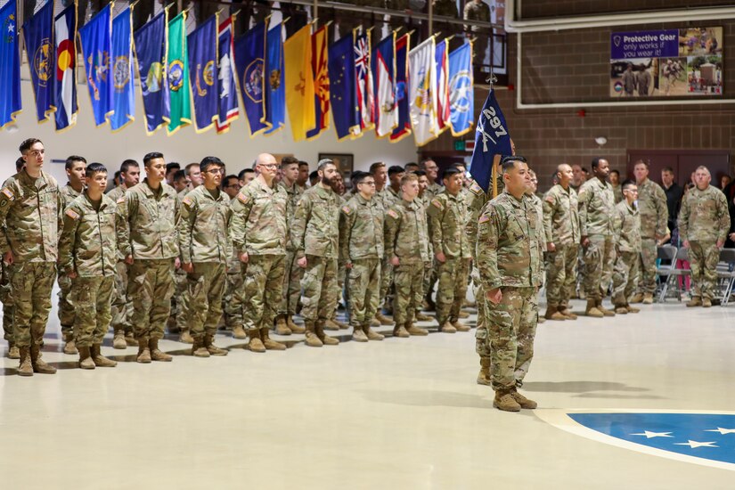 Alaska Army National Guard 1st Sgt. Oliver Meza, Bravo Company first sergeant, brings the formation to attention during a deployment ceremony for B Co., 1st Battalion, 297th Infantry Regiment, at the Alaska National Guard Armory on Joint Base Elmendorf-Richardson, Sept. 29, 2023.