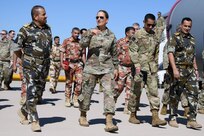 Maj. Gen. Kerry L. Muehlenbeck, adjutant general of Arizona, and director of the Arizona Department of Emergency and Military Affairs, walks with the Sultanate of Oman’s Vice Admiral Abdullah Al Raisi, chief of staff of the Sultan’s Royal Forces, and other military officials during a tour of Goldwater Air National Guard Base in Phoenix Sept. 25, 2023. The Sultanate of Oman and Arizona became partners under the Department of Defense National Guard Bureau State Partnership Program last year.