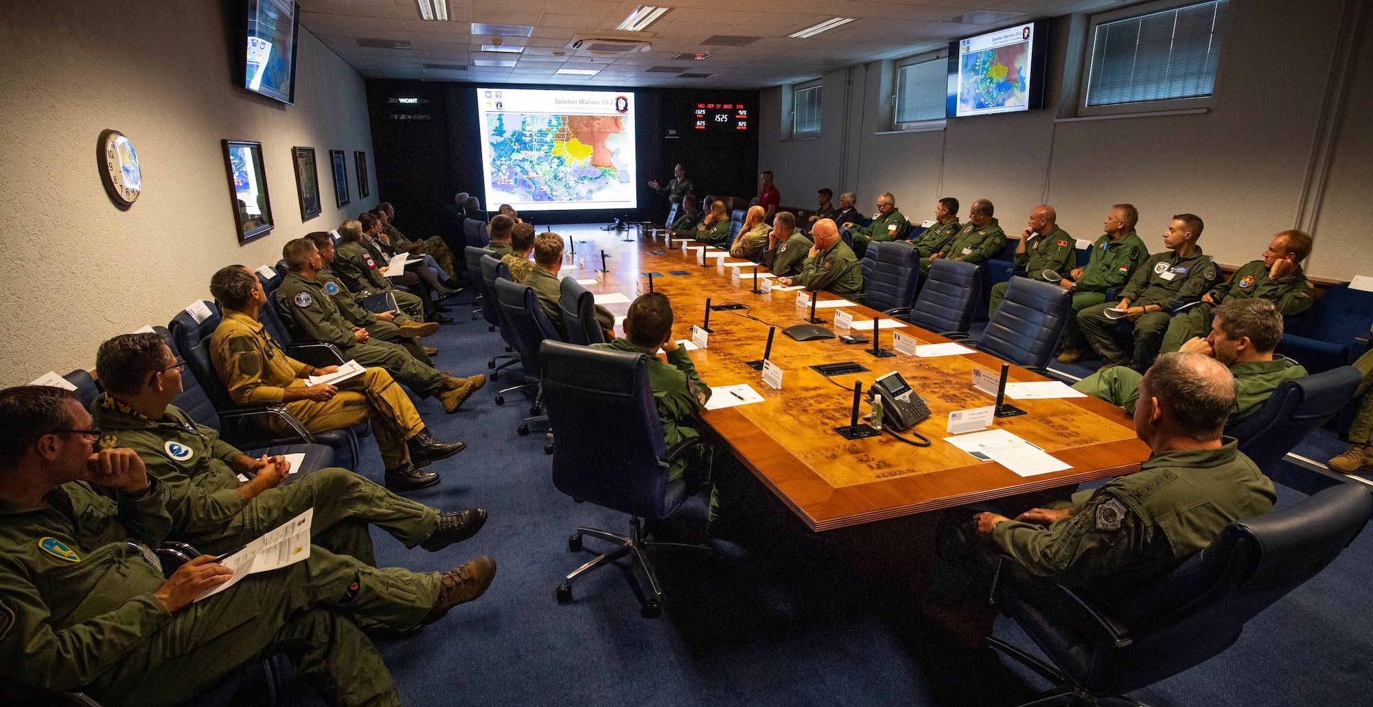 United States Air Forces in Europe, Air Forces Africa Warfare Center (UAWC) leadership provide a mission brief on the UAWC to U.S. Air Force Gen. James B. Hecker, USAFE-AFAFRICA commander, and NATO Air Chiefs at Einsiedlerhof Air Base, Germany, Sept. 27, 2023. The UAWC's mission is to support training for joint Allies and partner nation warfighters at the tactical, operational and strategic levels using diverse modeling and simulation networks. (U.S. Air Force photo by Senior Airman Jared Lovett)
