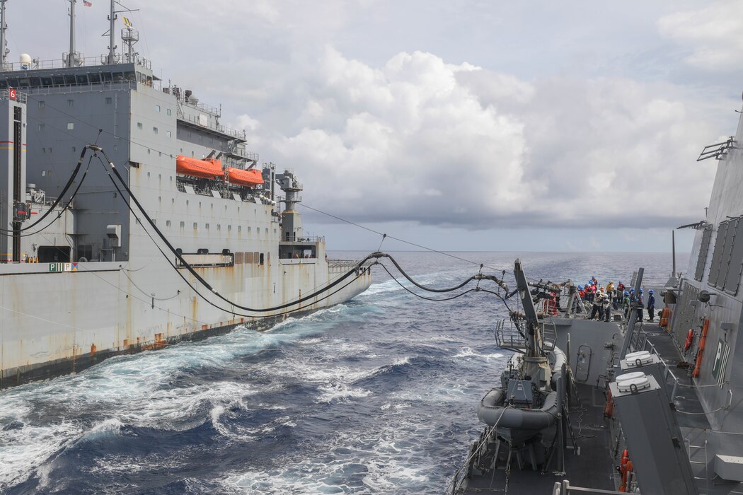 USS Rafael Peralta (DDG 115) replenishes from USNS Wally Schirra (T-AKE-8) in the South China Sea.