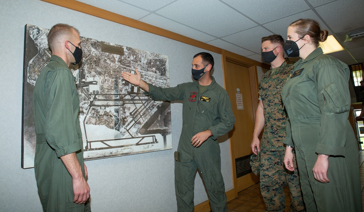U.S. Marine Corps Capt. Nicholas M.B. Patinos, center left, briefs U.S. Marines supporting Keen Edge at Joint Base Pearl Harbor-Hickam, Hawaii, Feb. 1, 2022. Exercise Keen Edge is a joint, bilateral command post exercise designed to facilitate interaction between and improve the interoperability of U.S. Forces and the Japan Self-Defense Forces. Keen Edge proves our ability to effectively and mutually respond to a regional crisis situation that might have direct and immediate impact on both countries. The U.S. and Japan Alliance is the cornerstone of peace and security in the Indo-Pacific, supporting a rules-based international order that promotes regional stability and prosperity.  (U.S. Marine Corps photo by Cpl. Benjamin M. Whitehurst)