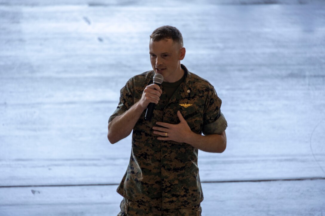 Lt. Col.William T. Graves Jr., incoming commander of Marine Transport Squadron (VMR) Belle Chasse, delivers a speech during the change of command ceremony at a VMR Hangar, Naval Air Station Joint Reserve Base, Belle Chasse, La. on June 2, 2023.