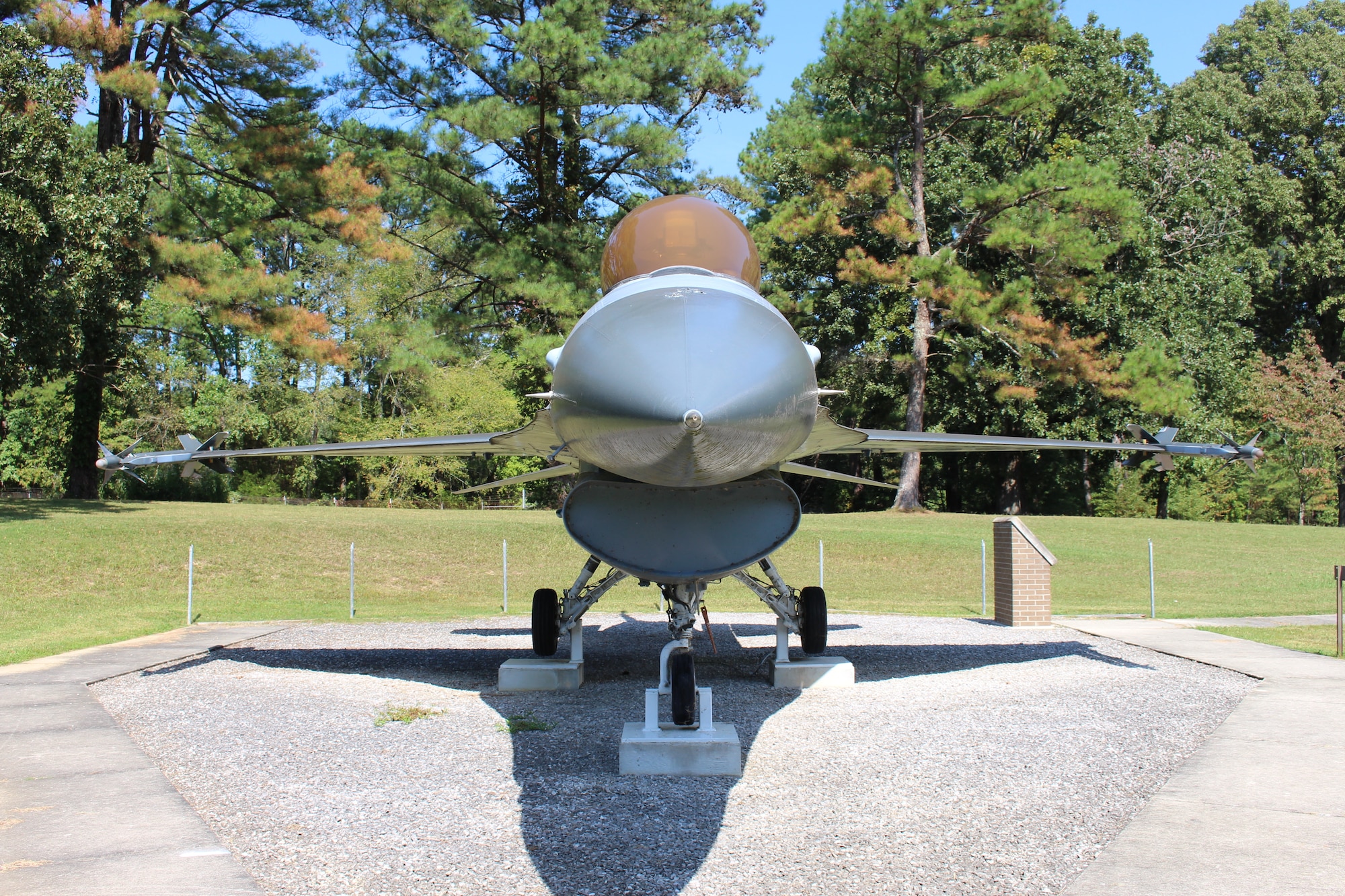 The static F-16 Fighting Falcon on display outside Gate 2 at Arnold Air Force Base, Tenn., is dedicated to Maj. Gen. Winfield Harpe. He was killed on Dec. 5, 1988, when the aircraft he was piloting crashed in Madrid, Spain. The display was dedicated in memory of Harpe during a June 26, 2010, ceremony. (U.S. Air Force photo by Kali Bradford)