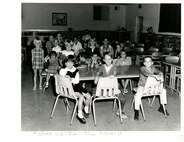 Students visit the school library, undated.