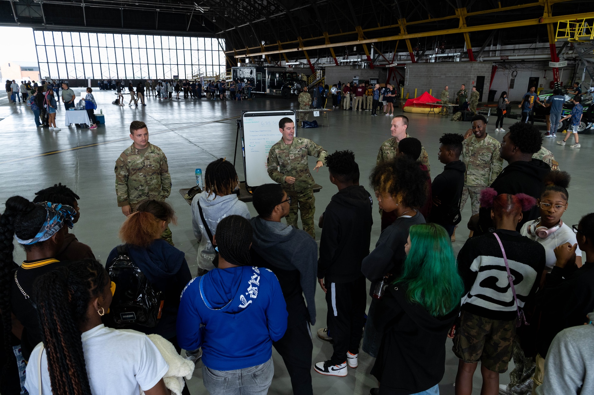 Students interact with military