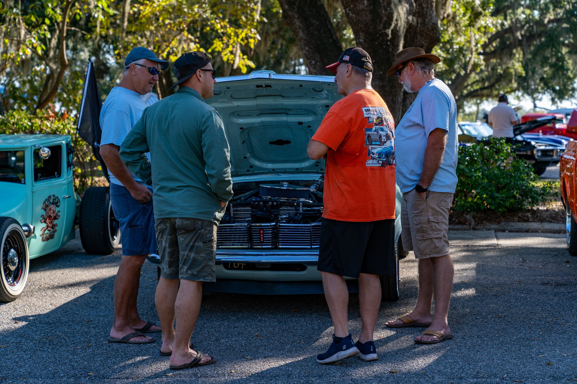 Attendees converse during the 2023 Cruisin' Keesler event at Keesler Air Force Base, Mississippi, Sept. 30, 2023.