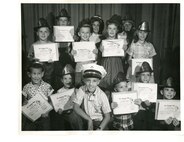 Students holding Fire Prevention Week awards, October 1964.