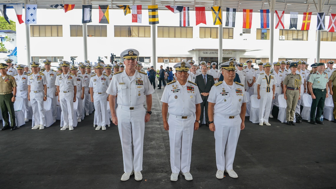MANILA, Philippines (Oct. 2, 2023) – Vice Adm. Karl Thomas, Commander, Seventh Fleet, left, Vice Adm. Toribio D. Adaci Jr., Flag Officer in Command, Philippine Navy, center, and Commodore Joe Anthony C. Orbe, Commander, Naval Forces Southern Luzon, pose for a photo with service members of participating nations of Sama Sama 2023. MTA Sama Sama is a multilateral exercise including forces from Philippines, the United States, Australia, France, Japan, Canada and the United Kingdom designed to promote regional security cooperation, enhance maritime interoperability, and maintain and strengthen maritime partnerships. (U.S. Navy photo by Mass Communication Specialist Sean Lynch)