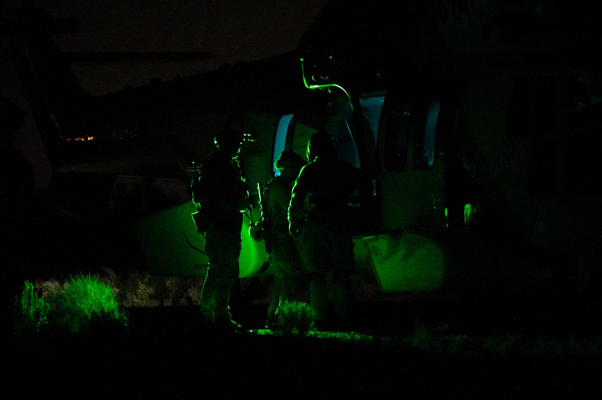 U.S. Airmen, training with the 68th Rescue Squadron, prepare to load simulated casualties onto an aircraft during the Combat Leader Course at Davis-Monthan Air Force Base, Ariz., Aug. 23, 2023. This section of the CLC gave the Airmen the opportunity to practice realistic casualty exfiltration. (U.S. Air Force photo by Airman 1st Class Devlin Bishop)