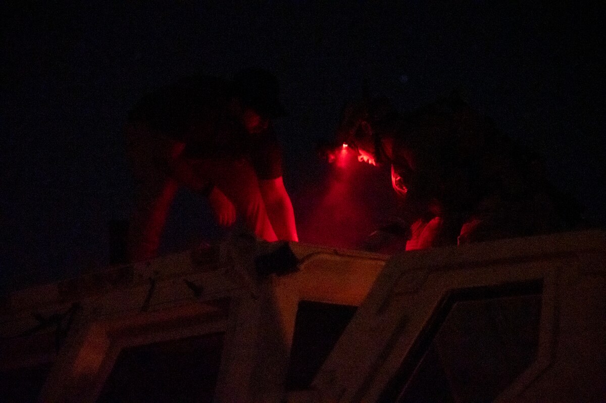 A U.S. Airmen, training with the 68th Rescue Squadron, cuts through a piece of sheet metal simulating the roof of a vehicle to access simulated casualties during the Combat Leader Course at Davis-Monthan Air Force Base, Ariz., Aug. 24, 2023. The exercise simulated vehicle damage which required the CLC student to find an alternate method of reaching the casualties. (U.S. Air Force photo by Airman 1st Class Devlin Bishop)