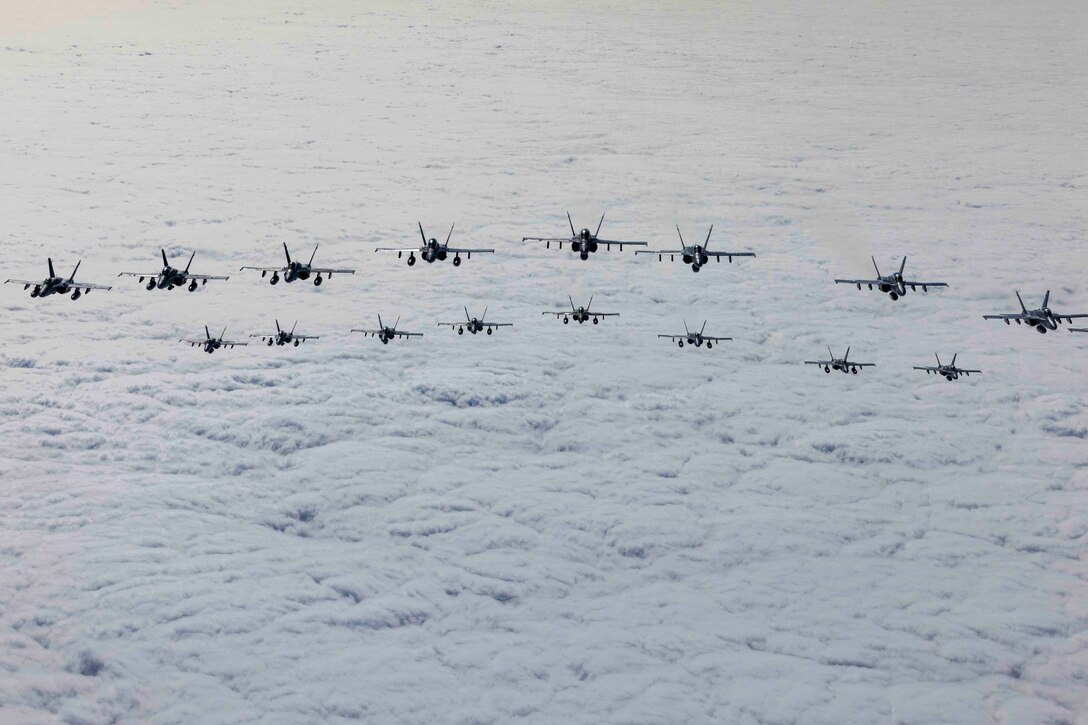 Marines conduct a mass formation flight to honor Marine Fighter Attack Training Squadron 101 on the day of its deactivation at Marine Corps Air Station Miramar, Calif., Sept. 29, 2023.