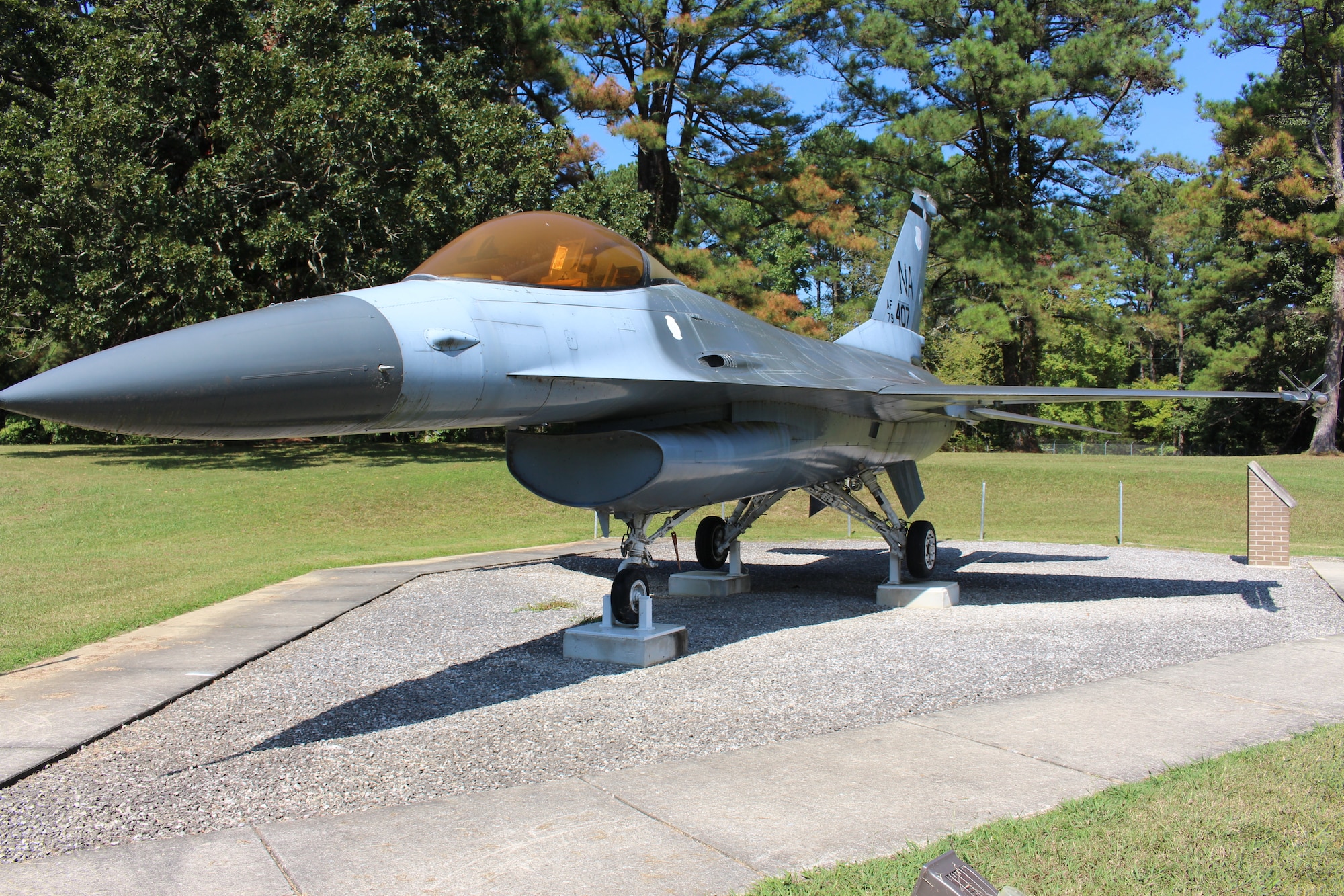 The static F-16 Fighting Falcon on display outside Gate 2 at Arnold Air Force Base, Tenn., is dedicated to Maj. Gen. Winfield Harpe. He was killed on Dec. 5, 1988, when the aircraft he was piloting crashed in Madrid, Spain. The display was dedicated in memory of Harpe during a June 26, 2010, ceremony. (U.S. Air Force photo by Kali Bradford)