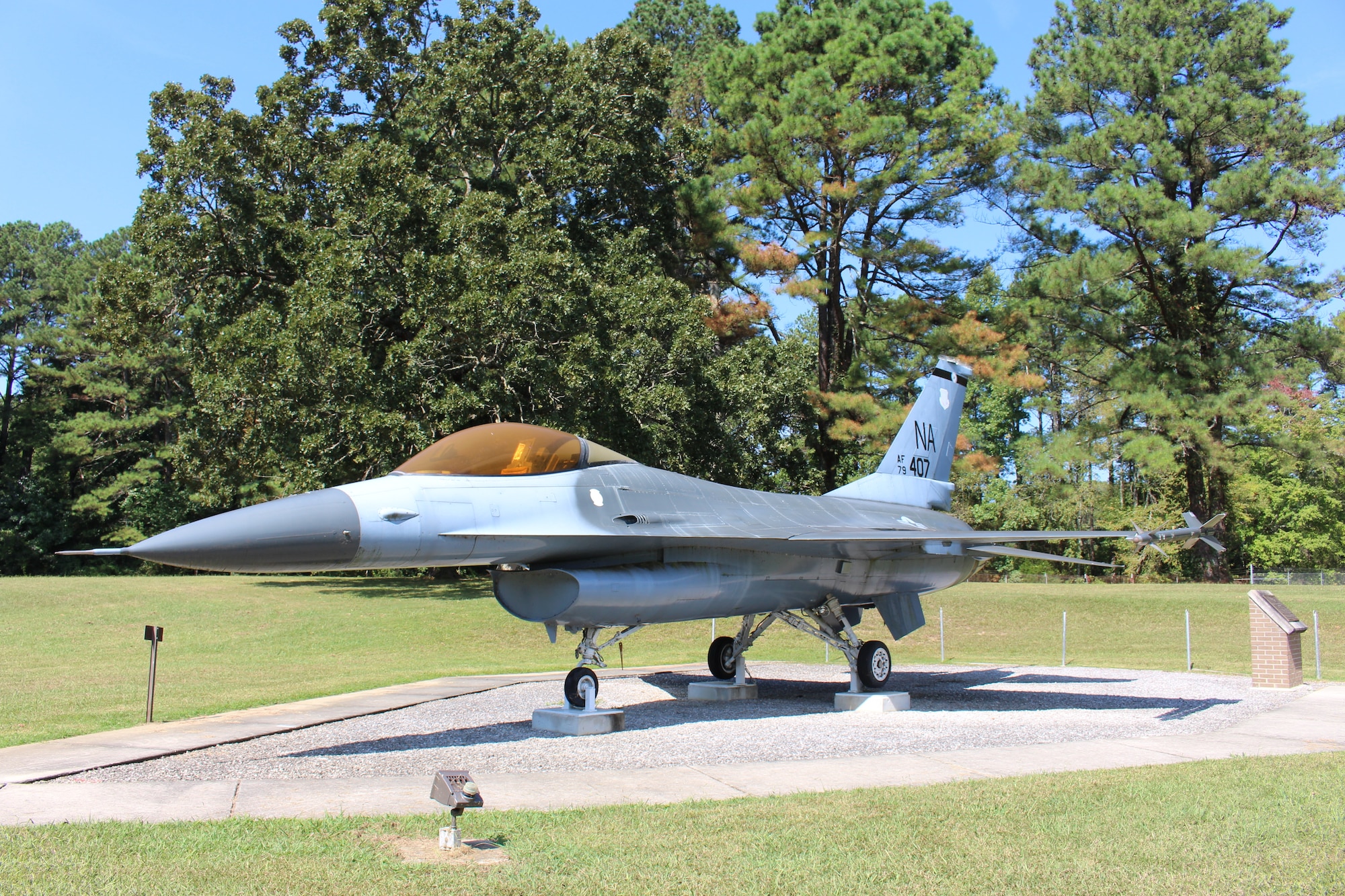 The static F-16 Fighting Falcon on display outside Gate 2 at Arnold Air Force Base, Tenn., is dedicated to Maj. Gen. Winfield Harpe. He was killed on Dec. 5, 1988, when the aircraft he was piloting crashed in Madrid, Spain. The display was dedicated in memory of Harpe during a June 26, 2010, ceremony. (U.S. Air Force photo by Kali Bradford)