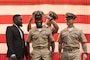 Chief Logistics Specialist Paul Bamgbala receives his combination cover during a chief petty officer pinning ceremony at Naval Base Kitsap-Bremerton, Washington Sept. 29, 2023. The rank of chief petty officer was officially established April 1, 1893, and holding the title "Chief" means a Sailor has achieved senior non-commissioned officer status. (U.S. Navy photo by Mass Communication Specialist 3rd Class Sophia H. Bumps)