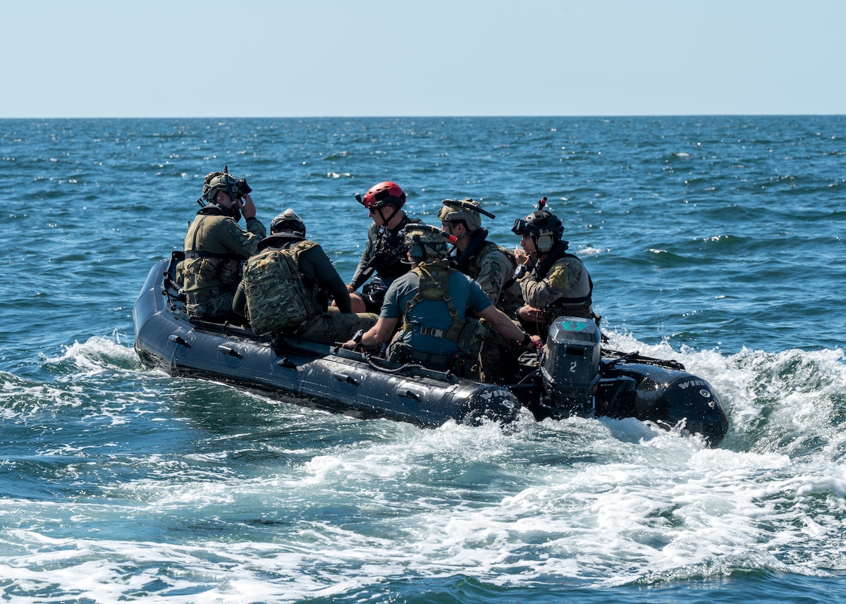 U.S. Airmen, training with the 68th Rescue Squadron, travel on a Rigged Alternate Method Boat near San Diego, Calif., Sept. 6, 2023. The Airmen used the RAMB to travel to a larger boat and rescue simulated casualties on board it. (U.S. Air Force photo by Airman 1st  Class William Finn V)