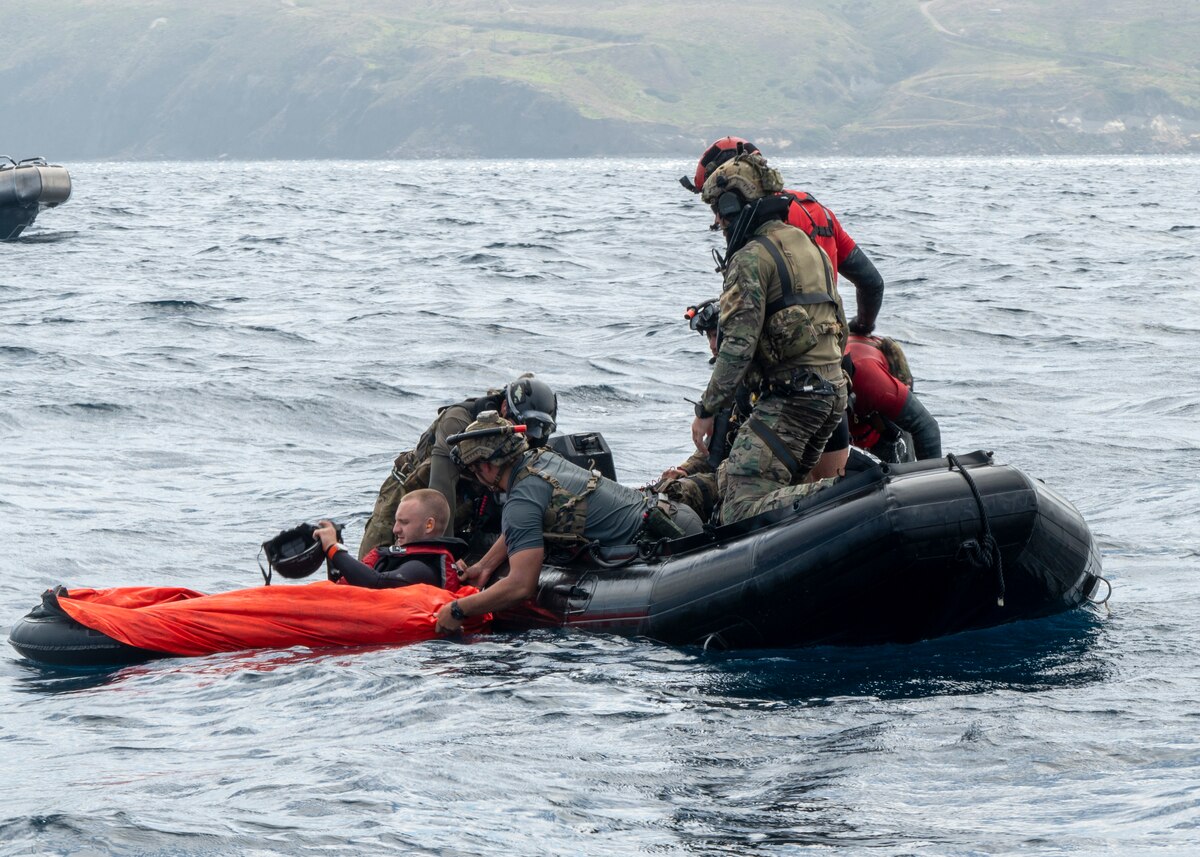 U.S. Airmen, training with the 68th Rescue Squadron, rescue a simulated casualty off the coast of Calif., Sept. 12, 2023. The Airmen searched a marked area of the Pacific Ocean before locating and loading the casualty onto their Rigged Alternate Method Boat. (U.S. Air Force photo by Airman 1st Class William Finn V)