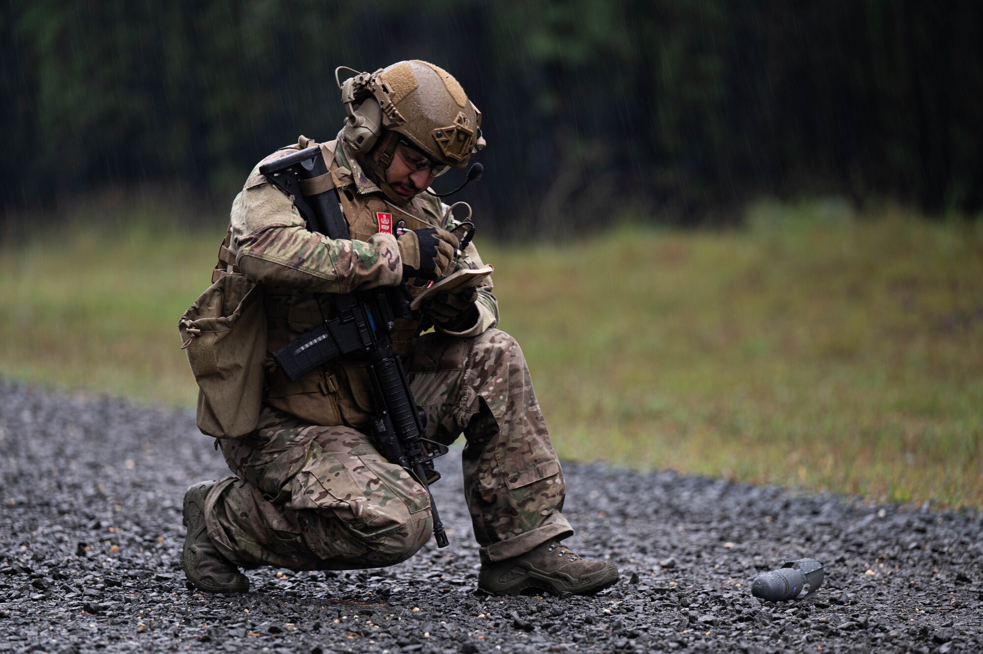 U.S. Air Force Airmen assigned to Joint Base McGuire-Dix-Lakehurst, explosive ordnance disposal technicians from the 87th Civil Engineer Squadron, prepare to dispose of the training unexploded ordinance at Joint Base McGuire-Dix-Lakehurst, N.J., on Sept 26, 2023. The EOD technicians are trained to clear unexploded ordinance from an improvised flight line. (U.S. Air Force photo by Airman 1st Class Aidan Thompson)