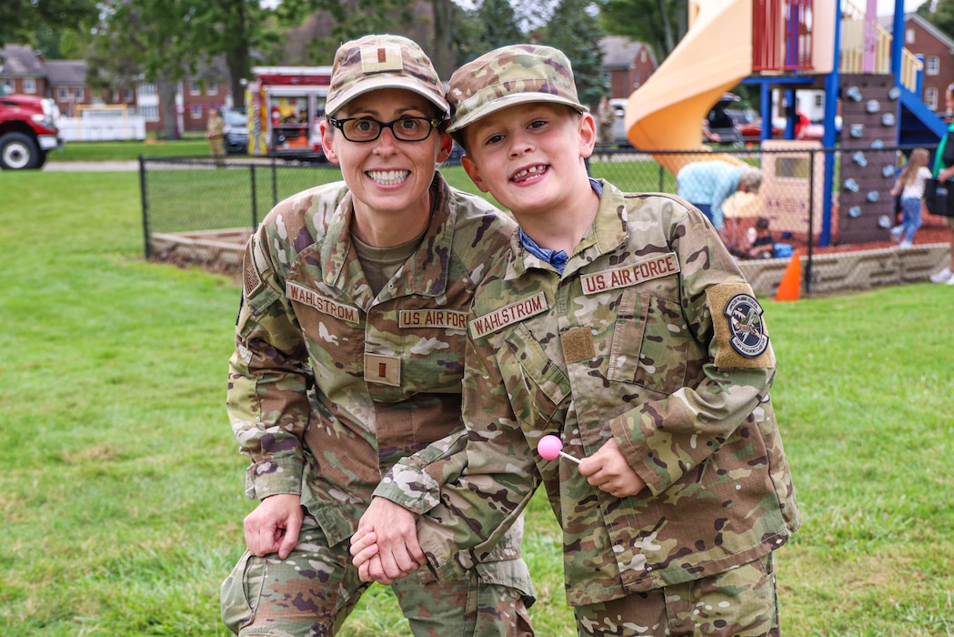 U.S. Air Force 2nd Lt. Elise Wahlstrom, a public affairs officer from the 127th Wing, and her son, enjoy the unit's family appreciation day, Selfridge Air National Guard Base, Michigan, Sep. 9, 2023.