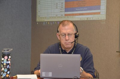 Man works at a laptop