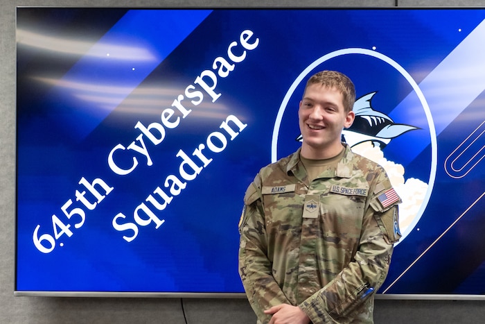 U.S. Space Force Specialist 3 Andrew Adams, 645th Cyberspace Squadron defensive cyber operator, poses for a photo at Patrick Space Force Base, Florida, Oct. 2, 2023. Specialist Adams was selected for Below-the-Zone, a competitive selection that allows those with the rank of Airman 1st Class/Specialist 3 to achieve Senior Airman/Specialist 4, six months ahead of the standard promotion date. (U.S. Space Force photo by DeAnna Murano)