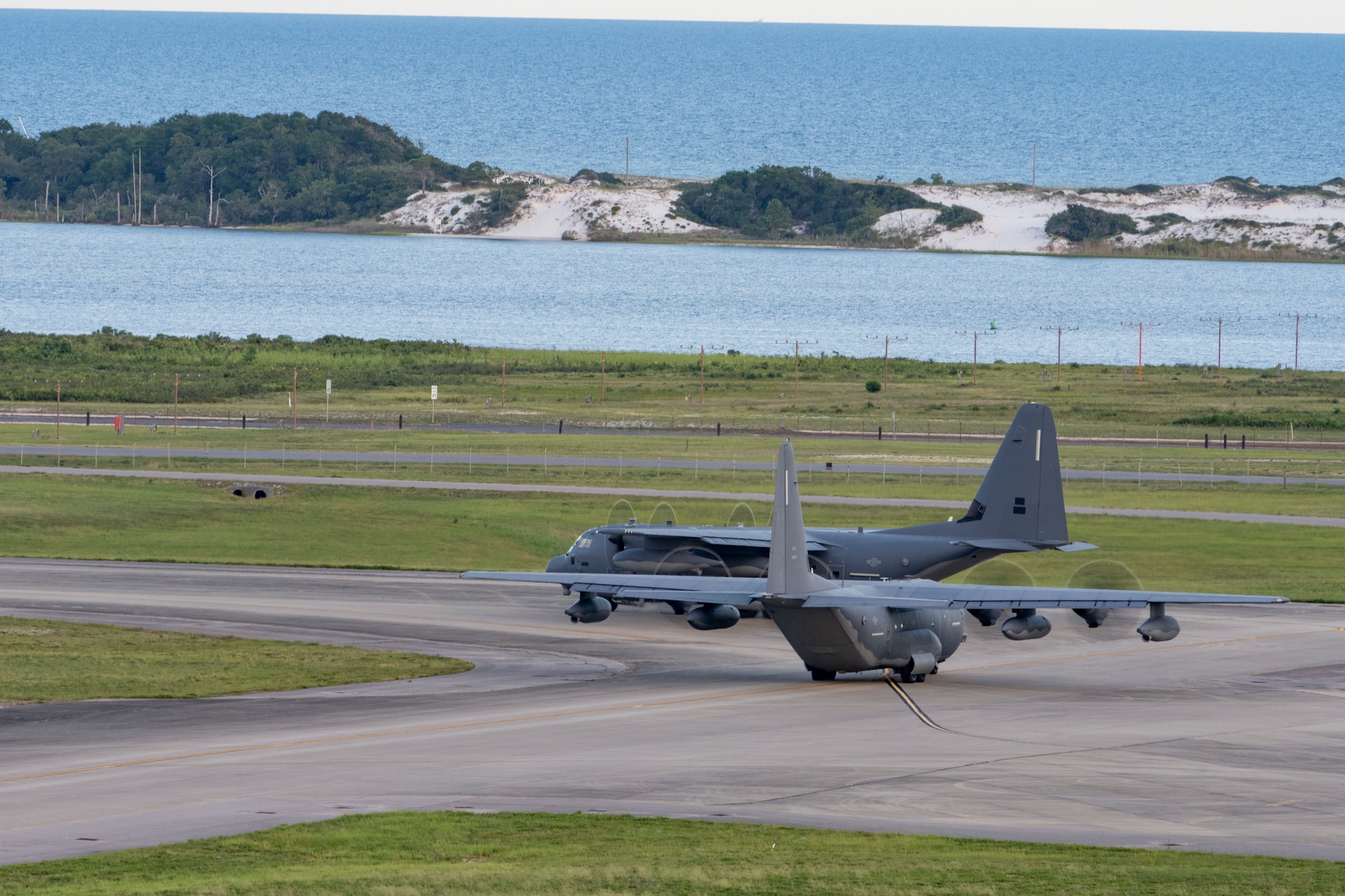 Two MC-130J Commando II aircraft from the 1st Special Operations Wing taxi from the parking ramp at Hurlburt Field, Florida, Jul. 6, 2023. The 1st Special Operation Wing, especially postured for rapid intervention in any crisis or conflict, launched two MC-130Js in support of U.S. Southern Command to enhance collective readiness, capability and contribute to regional security in the Western Hemisphere.