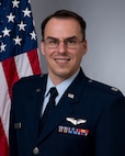 Lt. Col. (Dr.) Adam Willis, Defense Advanced Research Projects Agency program manager, poses for an official photo. As the DARPA program manager, Willis will focus on the challenges of casualty care within the near-pear environment, biomechanics of brain injury, neuroergonomics of operational tasks, and more. (U.S. Air Force photo)