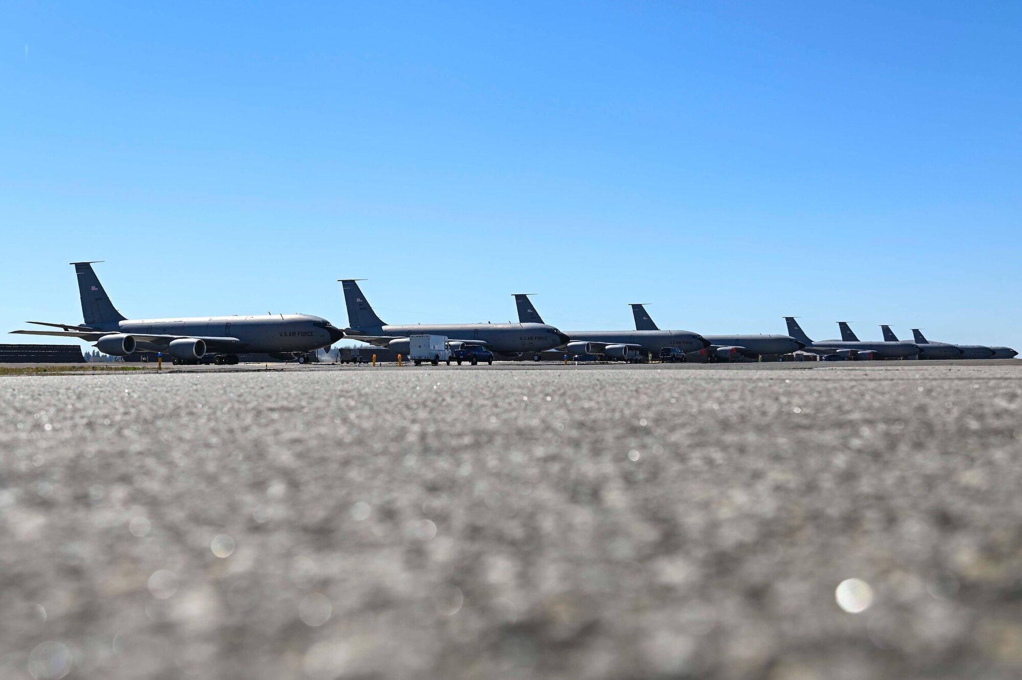 Wide view photo of several KC-135s lined up