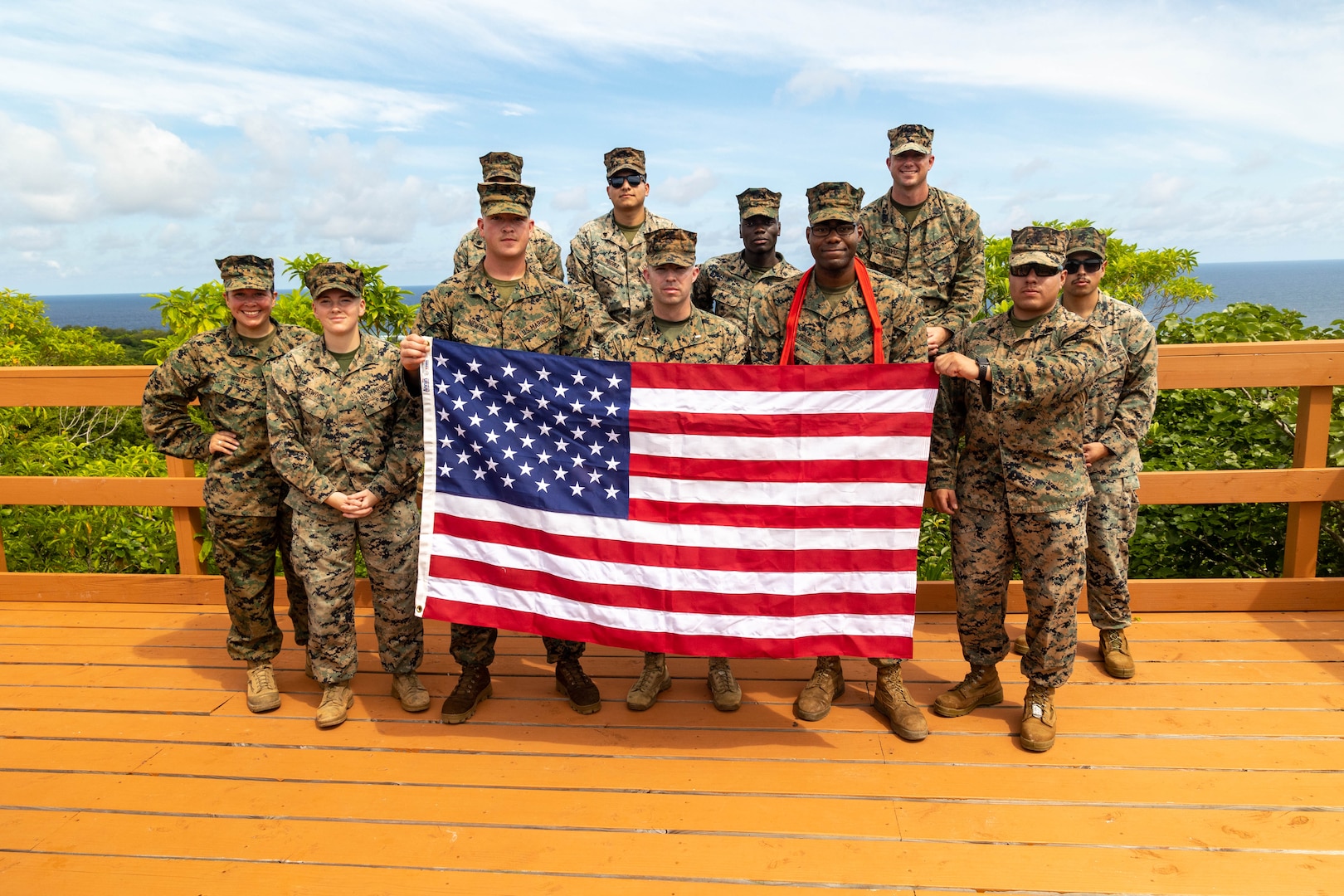 U.S. Marines with Task Force Koa Moana 23 pose for a photograph at the conclusion of a promotion ceremony for Cpl. Trent Henry, a native of El Paso, Texas and a combat photographer with the task force, atop Bloody Nose Ridge in Peleliu, Palau, Sept. 1, 2023. Task Force Koa Moana 23, composed of U.S. Marines and Sailors from I Marine Expeditionary Force, deployed to the Indo-Pacific to strengthen relationships with Pacific Island partners through bilateral and multilateral security cooperation and community engagements. (U.S. Marine Corps photo by Staff Sgt. Courtney G. White)