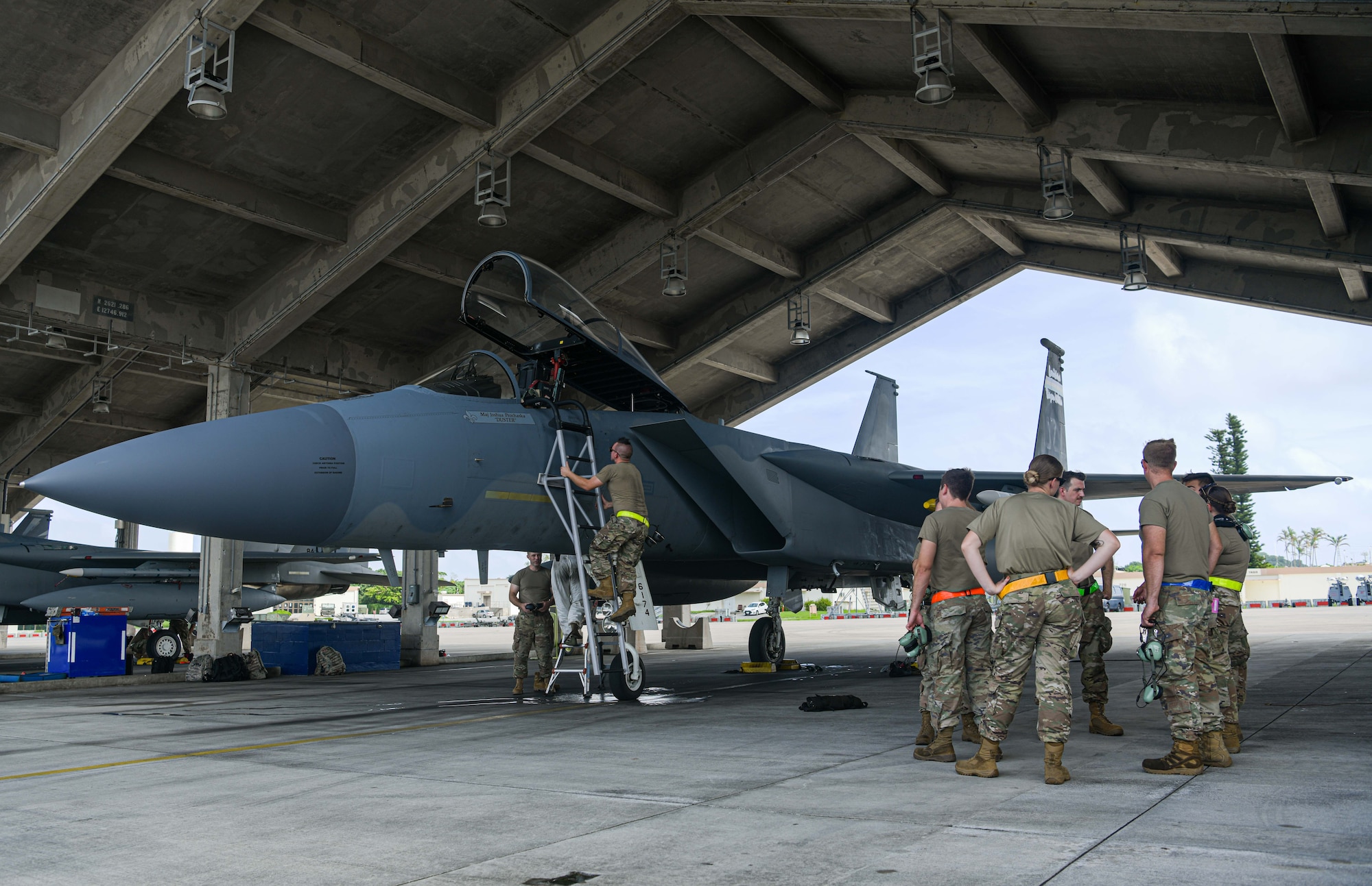 Airmen from the 104th Fighter Wing complete post flight checks on an F-15C Eagle.