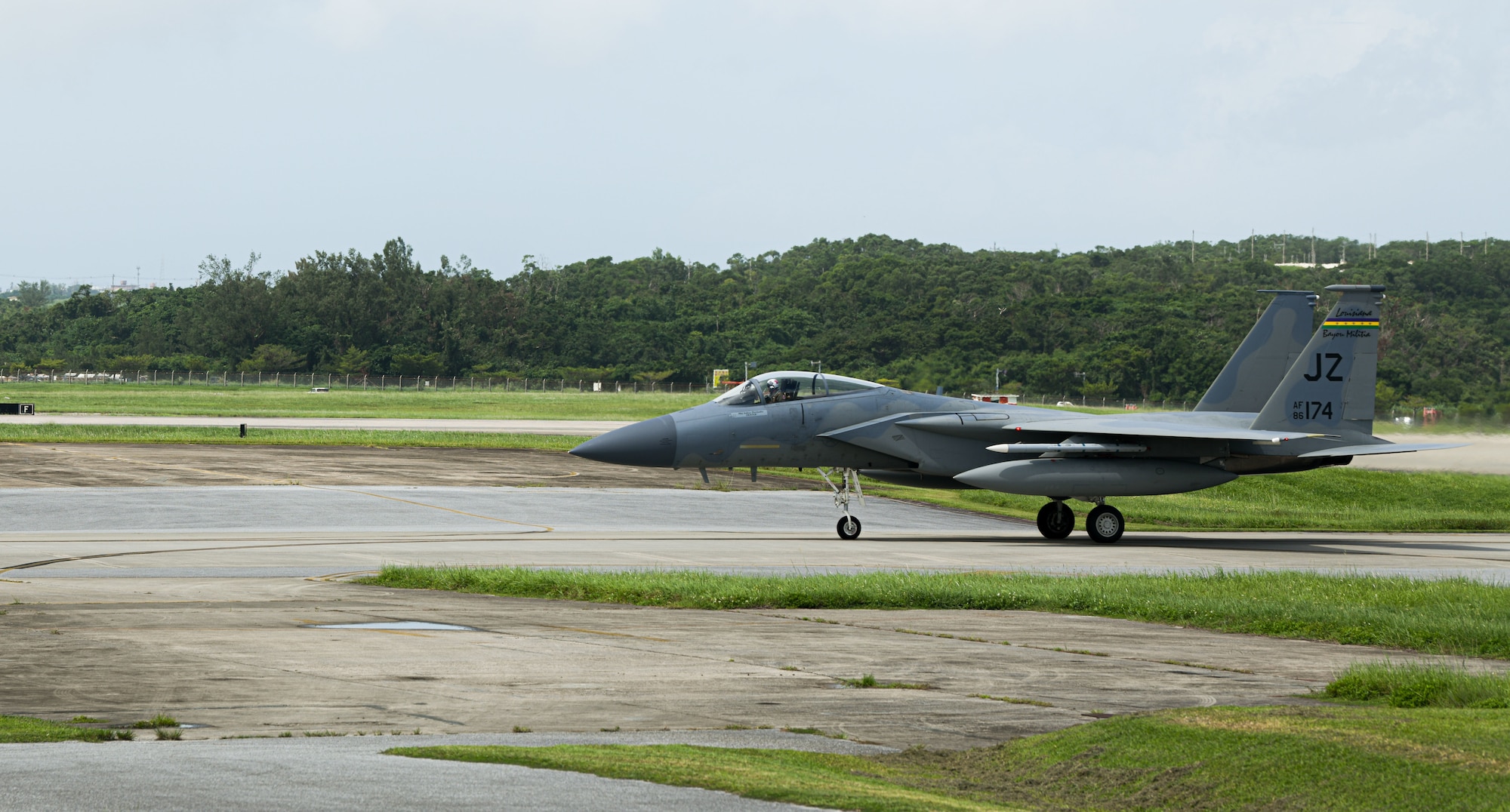 An F-15C Eagle assigned to the 144th Fighter Wing, Fresno Air Base, California, arrives at Kadena Air Base.