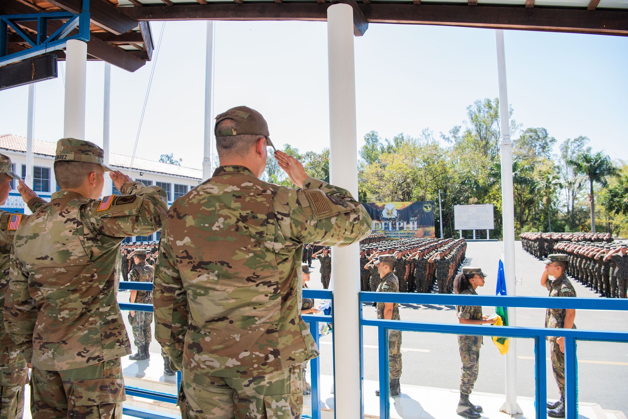 Command Sgt. Maj. Robert Alvarez, Western Hemisphere Institute for Security Cooperation and Chief Master Sgt. Yusef Saad, IAAFA’s Senior Enlisted Leader, salute during a retreat ceremony at the Aeronautics Specialist School in Sao Paolo, Brazil, Aug. 22, 2023. The Inter-American Air Forces Academy led the professional development subject matter expert exchange with the Brazilian Air Force. It was the first visit of its kind in over a decade. (U.S. Air Force photo by Vanessa R. Adame)