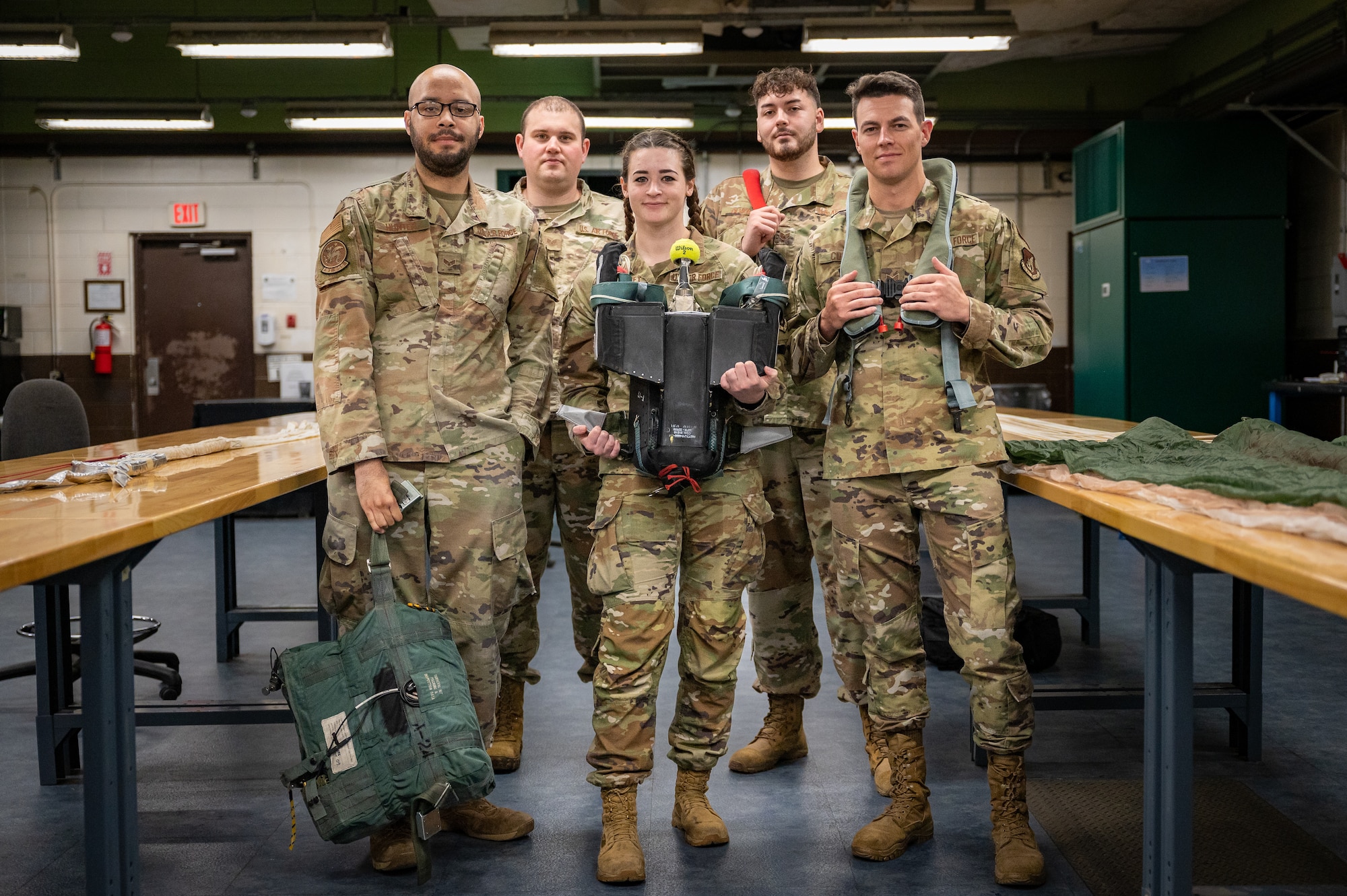 U.S. Air Force aircrew flight equipment specialists from the 51st Operational Support Squadron pose for a group photo at Osan Air Base, Republic of Korea, Sept. 25, 2023. AFE specialists play a crucial role in managing the inspection, maintenance and adjustment of aircrew flight equipment, ensuring it remains in optimal working condition for 51st Fighter Wing pilots to protect the skies over Osan and the ROK. (U.S. Air Force photo by Staff Sgt. Thomas Sjoberg)
