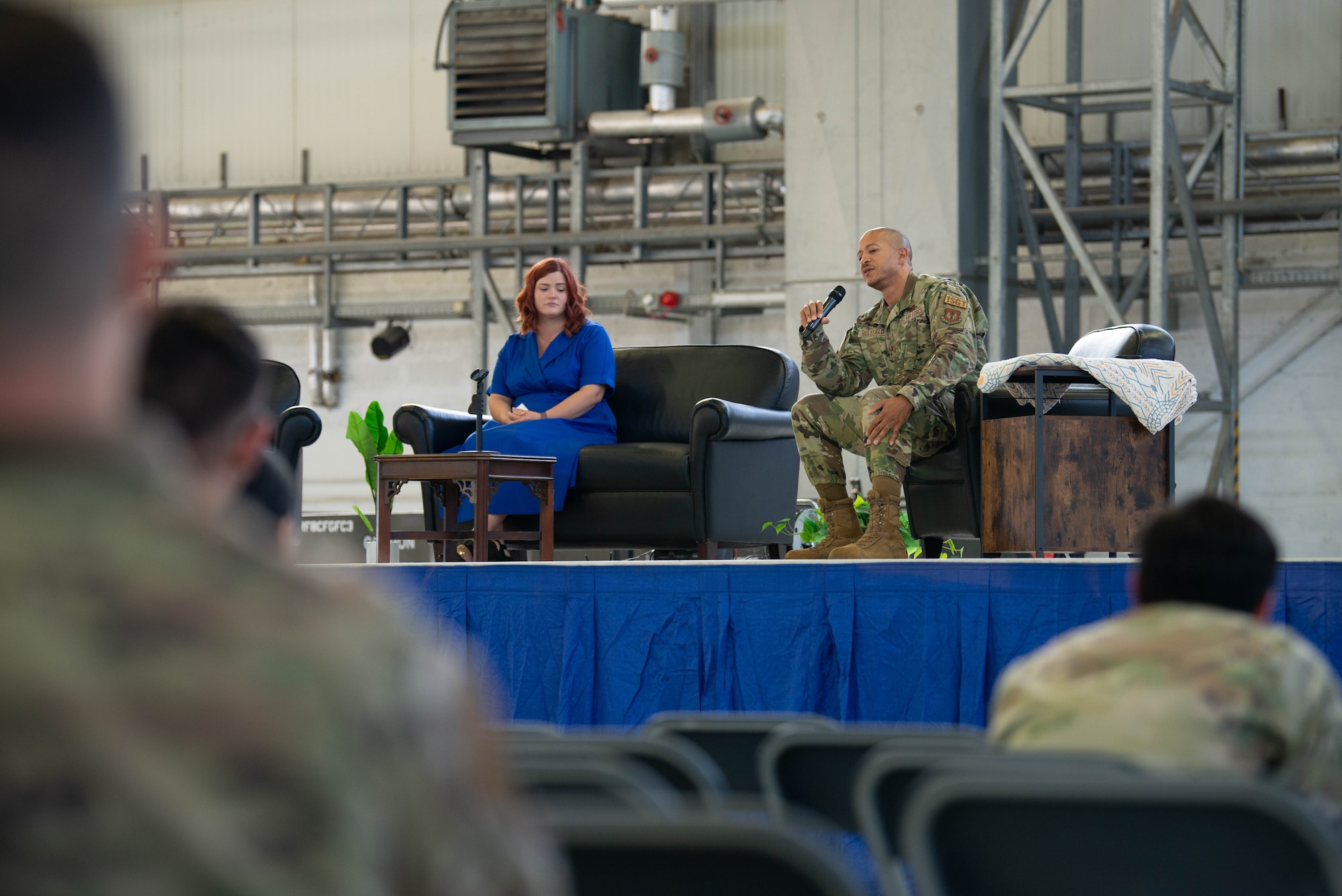 An Airman shares his story during a storytellers event