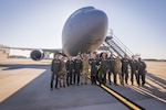 U.S. Air Force pilots and boom operators with the 141st Air Refueling Squadron, 108th Wing, New Jersey Air National Guard, in front of a KC-46A Pegasus at Joint Base McGuire-Dix-Lakehurst, New Jersey, Oct. 3, 2023. Left to right: pilot 1st Lt. Ashwin Deshpande; boom operators Staff Sgt. Nicole Stephenson and Tech. Sgt. Patrick Tracy; pilot Maj. Scott Mixdorf; boom operator Tech. Sgt. Bill Vigilante; pilots Maj. Bobby Pico, Col. Bill Liess, Lt. Col. Johann Hintz, and Capt. Brandon Johnson; boom operators Tech. Sgt. Christopher Howe, Master Sgt. Brian Kelly, and Master Sgt. Alissa Anderson.