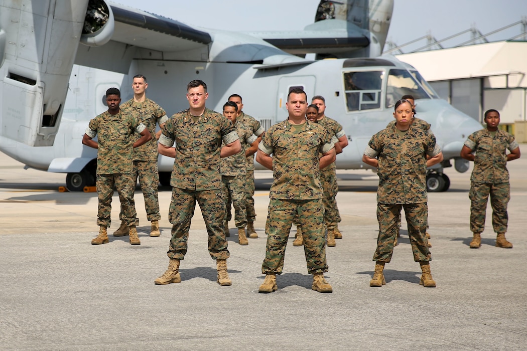 U.S. Marines with Site Support New River, Marine Aircraft Group 49 (MAG-49), pose in a group photo with the departing commanding officer, Lt. Col. Pascal Gonzalez on Marine Corps Air Station New River, in Jacksonville, North Carolina, May 5, 2023. Site Support New River provides support for MAG-49 during expeditionary operations.