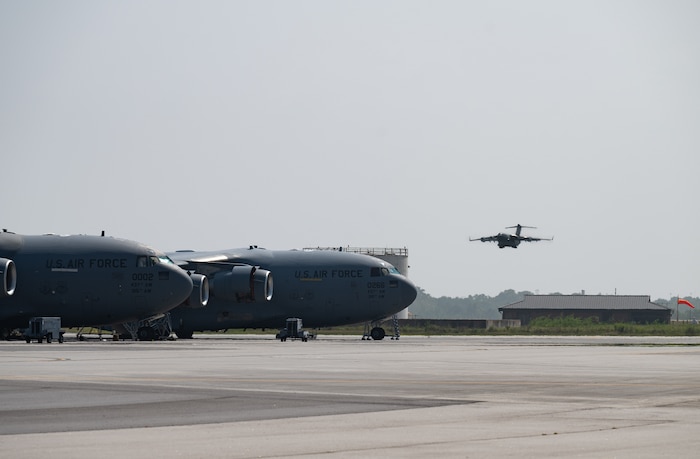Airmen are welcomed home from deployment by family and friends on the flight line