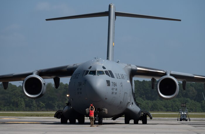 Airmen are welcomed home from deployment by family and friends on the flight line
