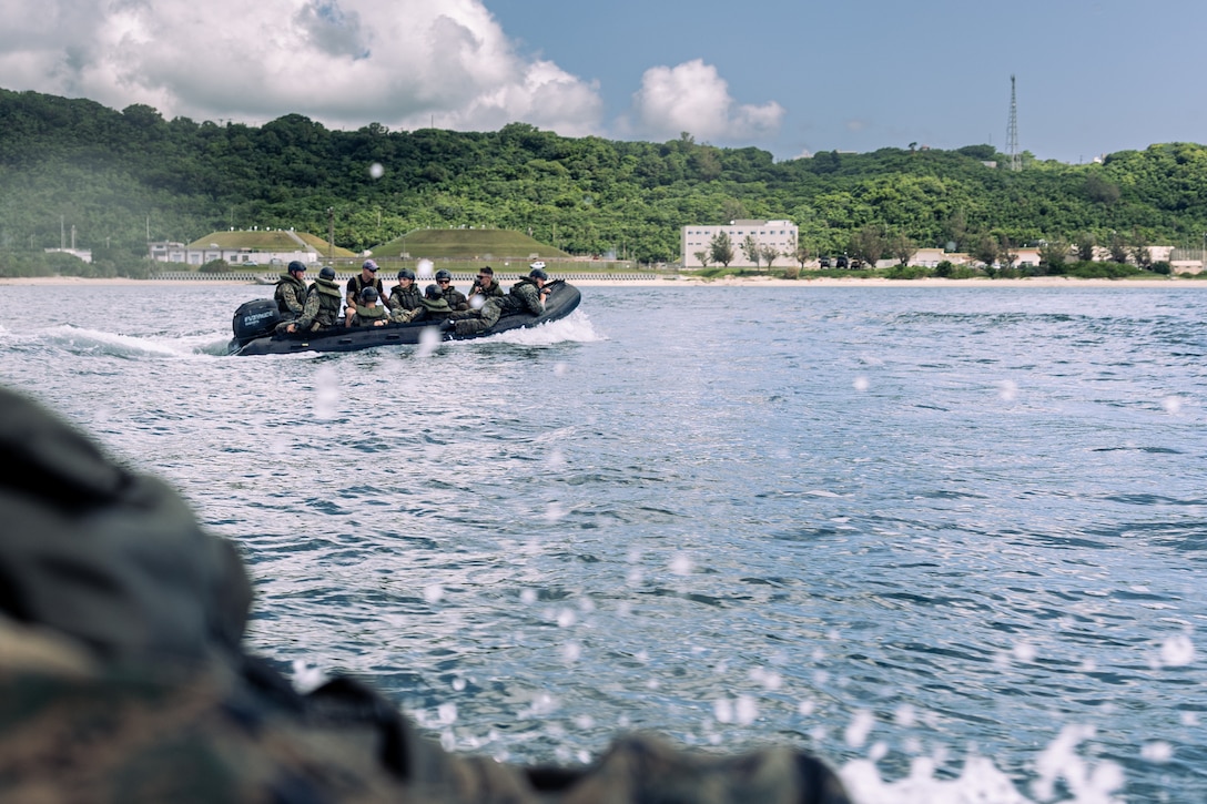 U.S. Marines from across III Marine Expeditionary Force perform a variety of tasks to operate a combat rubber raiding craft during a coxswain course at White Beach Naval Facility, Okinawa, Japan, Sept. 19, 2023. The coxswain and operations course hosted by Expeditionary Operations Training Group trained Marines in advanced boat handling skills necessary to operate a combat rubber raiding craft.