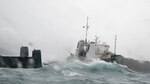 Coast Guard rescue crews assisted 12 people who were forced to abandon the 195-foot cargo vessel Bonnie G the morning of Oct. 4, 2023, after the vessel started taking on water and ran aground half a mile south from the local airport in St. Thomas, U.S. Virgin Islands.  Coast Guard is investigating this incident, assessing the pollution threat from the Bonnie G and coordinating with the vessel owner and local authorities to remove the pollution threat from this vessel as quickly and safely as possible.  (U.S. Coast Guard photo)