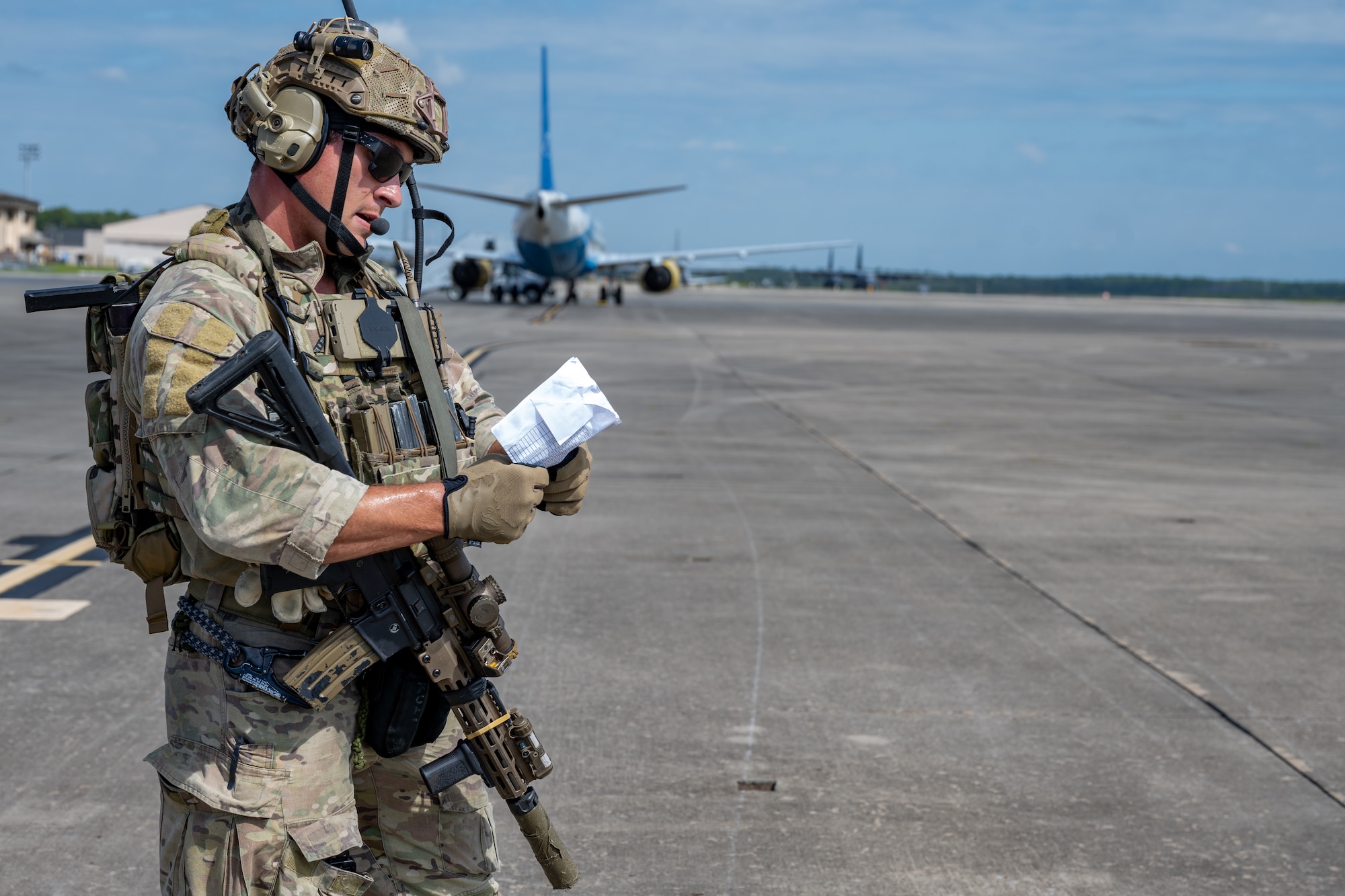 An Air Commando assigned to the 21st Special Tactics Squadron participates in an airfield establishment exercise at Hurlburt Field, Florida, Sept. 21, 2023. Members of the 21st STS jumped from an MC-130J Commando II during the 94th Joint Civilian Orientation Conference at Hurlburt Field. (U.S. Air Force photo by Airman 1st Class Hussein Enaya)