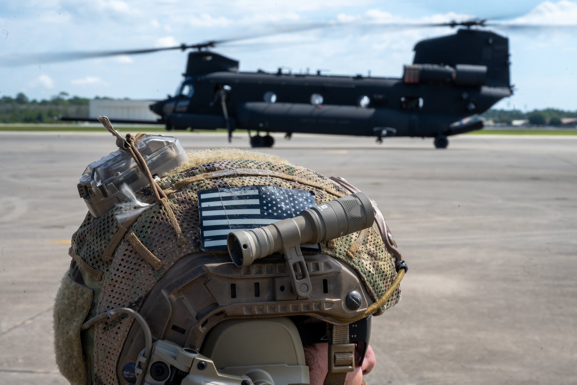 An Air Commando assigned to the 21st Special Tactics Squadron participates in an airfield establishment exercise at Hurlburt Field, Florida, Sept. 21, 2023. Members of the 21st STS jumped from an MC-130J Commando II to conduct the airfield establishment exercise during the 94th Joint Civilian Orientation Conference at Hurlburt Field. (U.S. Air Force photo by Airman 1st Class Hussein Enaya)