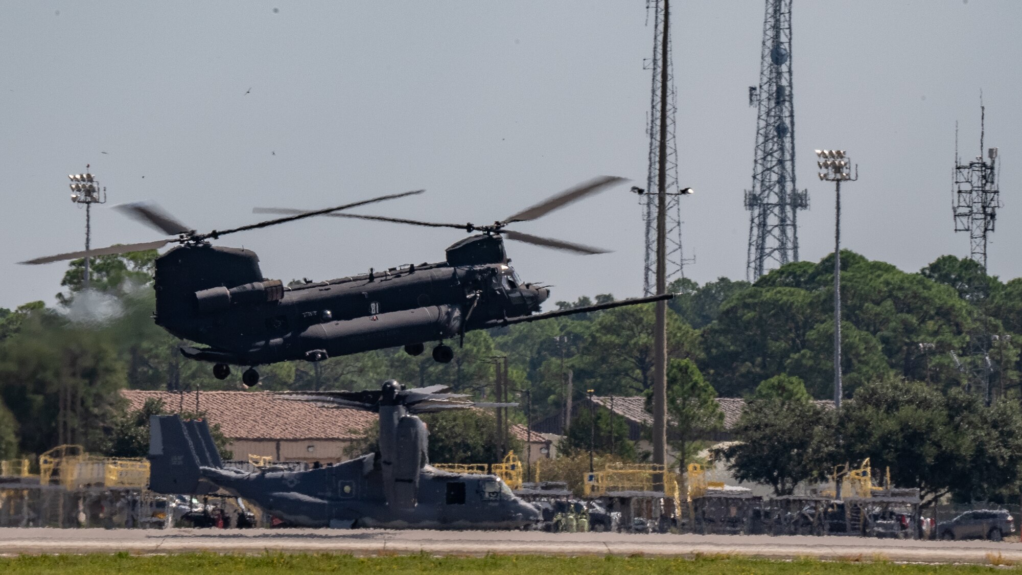 An MH-47G Chinook helicopter assigned to the 160th Special Operations Aviation Regiment prepares to land the flight line during the 94th Joint Civilian Orientation Conference at Hurlburt Field, Florida, Sept. 21, 2023. JCOC is the Department of Defense’s public liaison program, designed to provide American business and community leaders with a deeper understanding of the military by showcasing the rewards and challenges service members face both on and off the battlefield. (U.S. Air Force photo by Airman 1st Class Hussein Enaya)