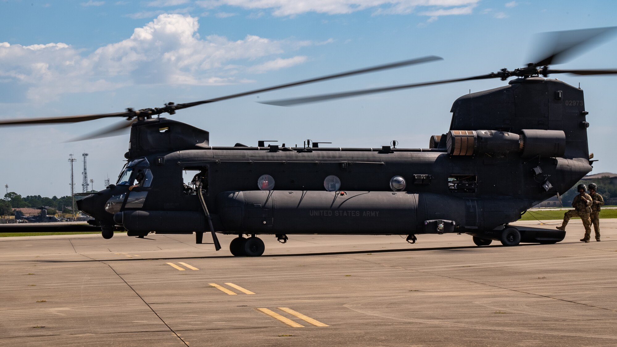 A U.S. Army MH-47G Chinook helicopter assigned to the 160th Special Operations Aviation Regiment is positioned on the flight line during the 94th Joint Civilian Orientation Conference at Hurlburt Field, Florida, Sept. 21, 2023. JCOC is the Department of Defense’s public liaison program, designed to provide American business and community leaders with a deeper understanding of the military by showcasing the rewards and challenges service members face both on and off the battlefield. (U.S. Air Force photo by Airman 1st Class Hussein Enaya)