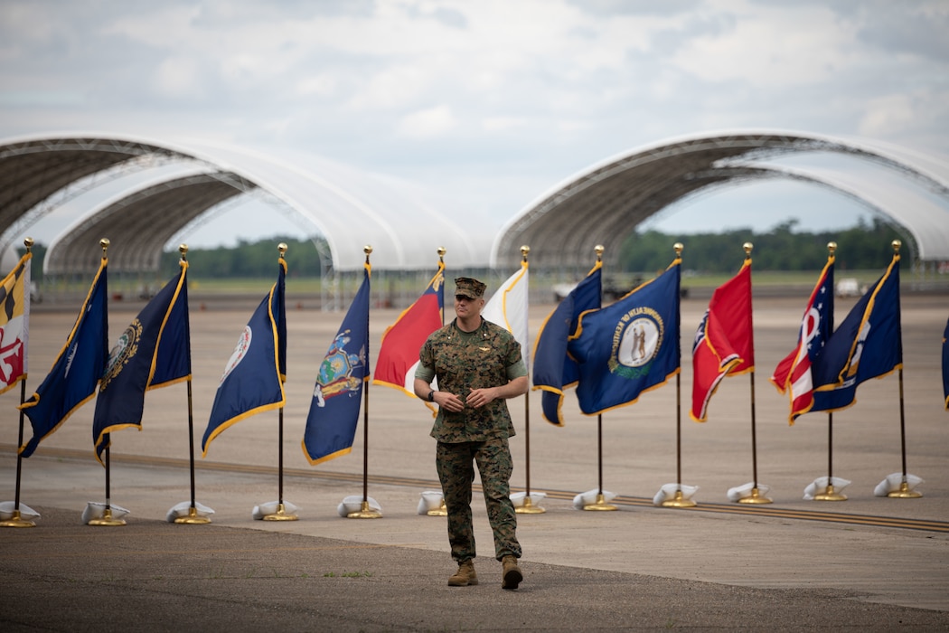 U.S. Marine Corps Lt. Col. William Smyth commanding officer, Site Support New Orleans addresses the audience during the Marine Aircraft Group relief and appointment ceremony, at Naval Air Station Joint Reserve Base New Orleans, Louisiana, Apr.13, 2023. The ceremony exemplifies customs and tradition by showcasing the transfer of leadership between the outgoing and incoming sergeants major.