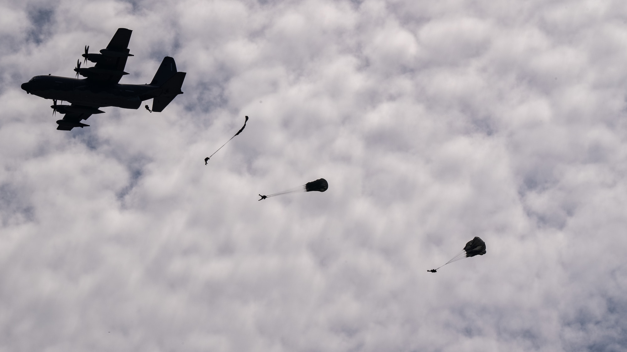 Air Commandos assigned to the 21st Special Tactics Squadron jump from an MC-130J Commando II near Hurlburt Field, Florida, Sept. 21, 2023. Members of the 21st STS jumped from the MC-130J to conduct an airfield establishment exercise during the 94th Joint Civilian Orientation Conference at Hurlburt Field. (U.S. Air Force photo by Airman 1st Class Hussein Enaya)