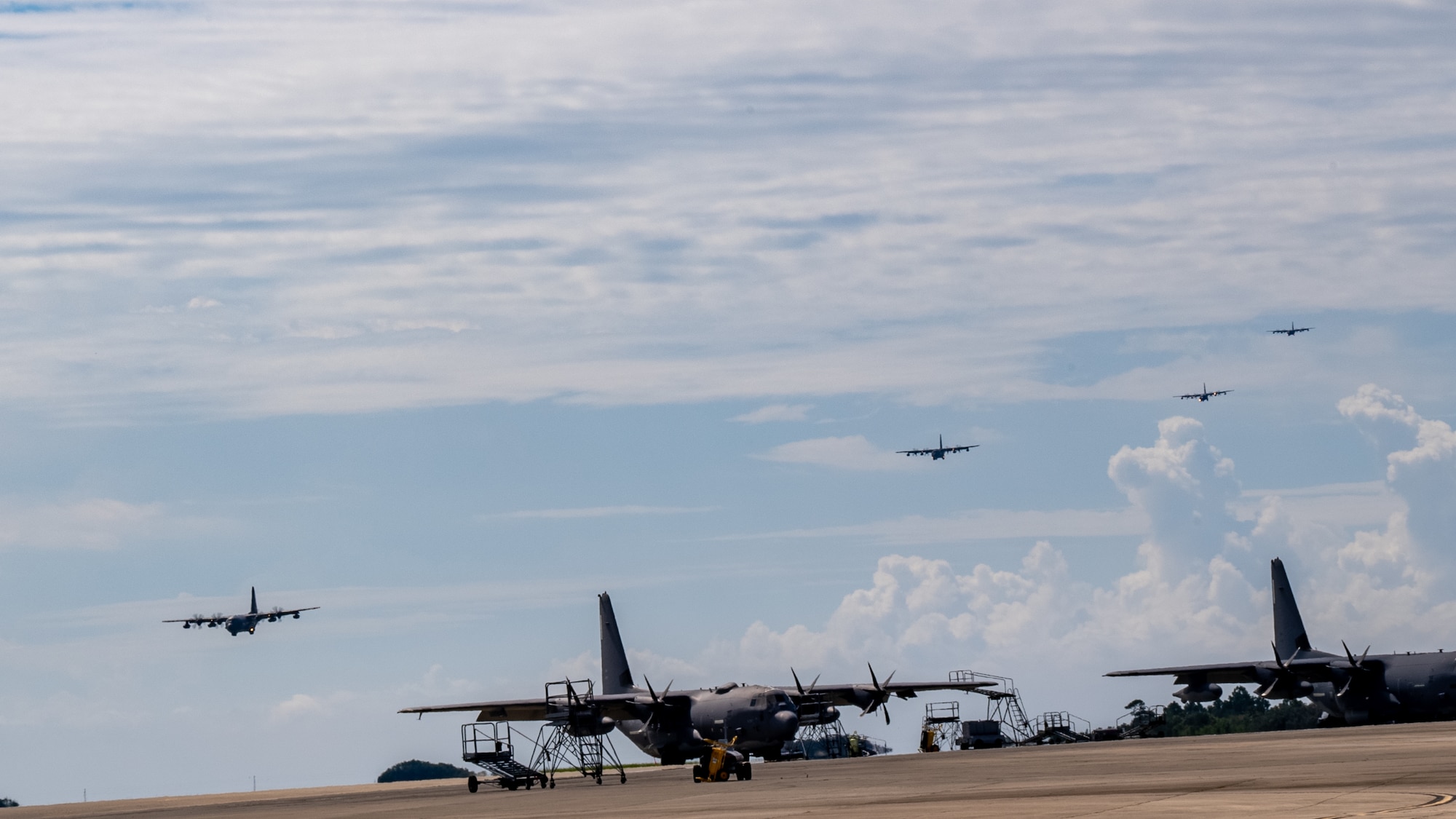 MC-130J Commando II aircrafts assigned to the 15th Special Operations prepare to land at Hurlburt Field, Florida, Sept. 21, 2023. Crews conducted a four-ship formation flight as part of a demonstration for the 94th Joint Civilian Orientation Conference at Hurlburt Field. (U.S. Air Force photo by Airman 1st Class Hussein Enaya)