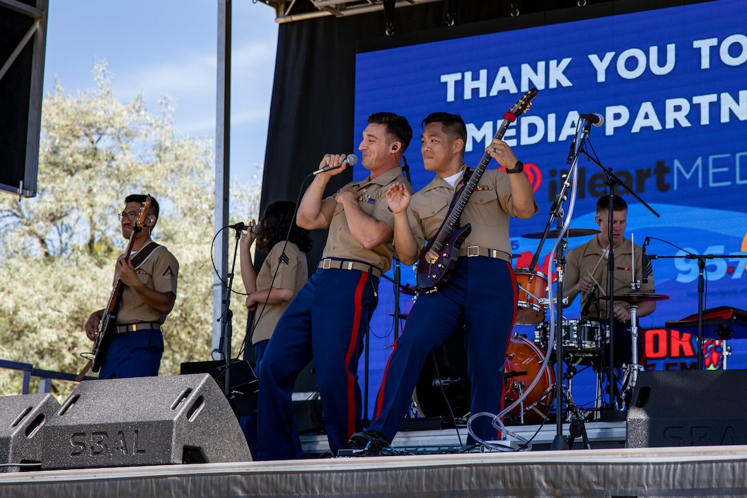 U.S. Marines with the 1st Marine Division Band, perform at the Seafair Festival in Seattle, Aug. 4, 2023. The Seafair Festival and Seattle Fleet Week offer people in the tri-state area an unparalleled opportunity to meet U.S. Marines, U.S. Navy Sailors, and U.S. Coast Guardsmen, and learn about the latest maritime capabilities. (U.S. Marine Corps photo by Sgt. Yvonna Guyette)