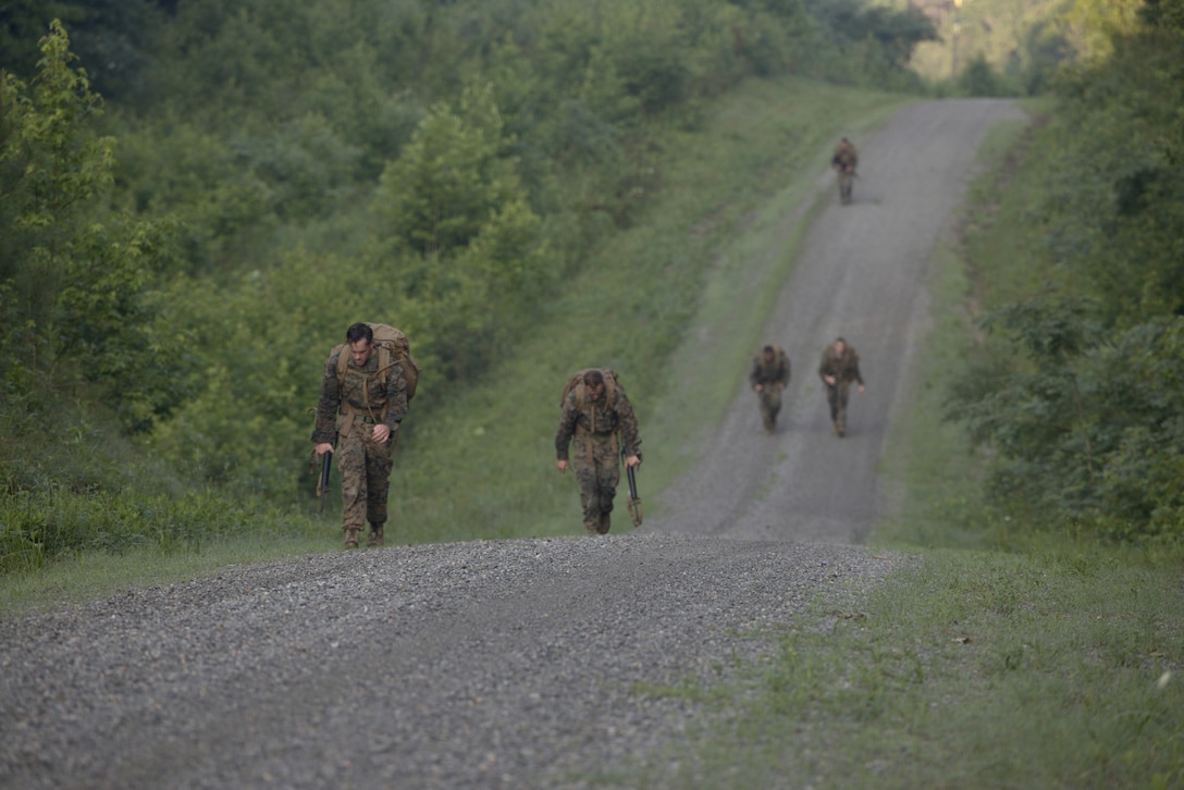 U.S. Marines with 2d Marine Division, conduct a ruck run during the Division Leadership Assessment Program at Fort Walker, Virginia, June 28, 2023. This program allows division leadership to assess Marines recently assigned to 2d MARDIV on their mental, moral and physical readiness for future command opportunities.