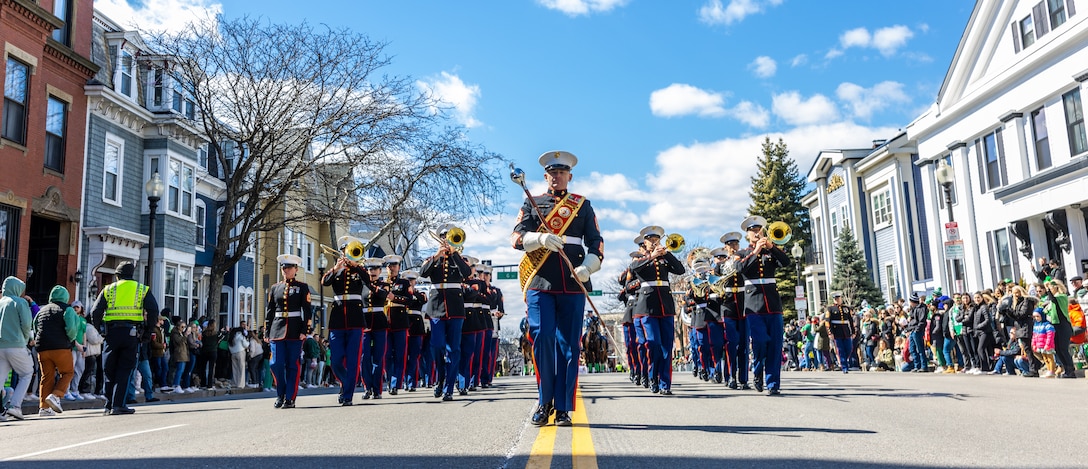 U.S. Marine Corps Gunnery Sgt. James W. Dempsey, Drum Major, Quantico Marine Corps Band, leads the Quantico Marine Corps Band during a performance at the South Boston St. Patrick’s Day Parade in Boston, Massachusetts, March 19, 2023. The Quantico Marine Corps Band provides musical support that fosters positive community relations, enhances troop morale, and promotes the Marine Corps recruiting program through events such as parades, concerts, and ceremonies. (U.S. Marine Corps photo by Lance Cpl. Kayla LeClaire)